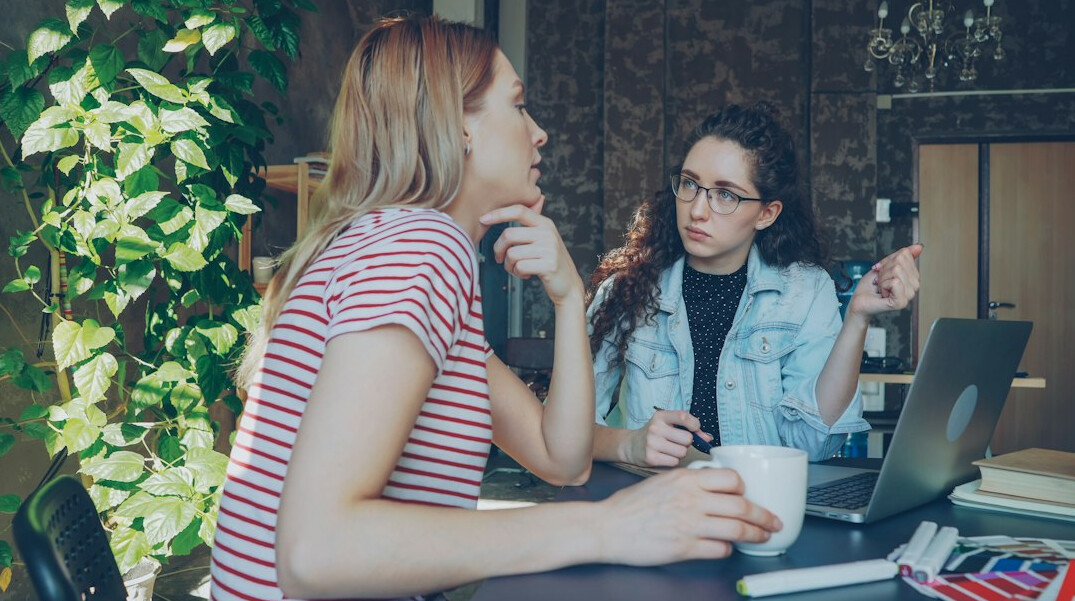 two colleagues having honest talk